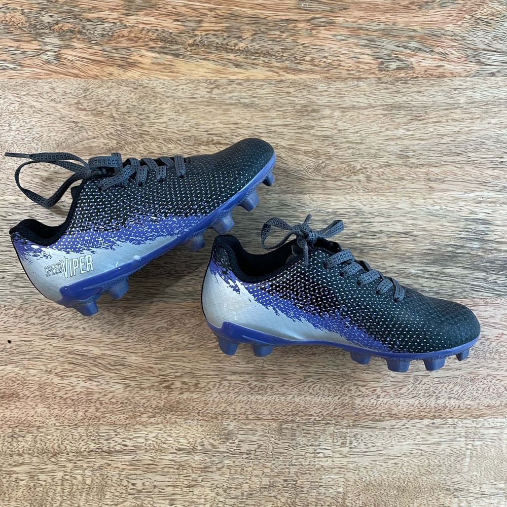 Purple and dark gray soccer cleats